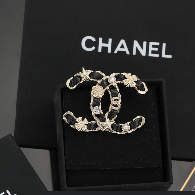 Ch*el brooches